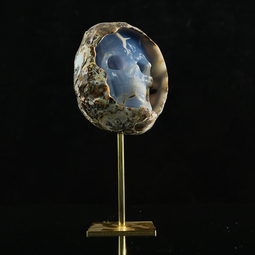 Blue Chalcedony Cave Carving Skull in Raw Crust — view 7