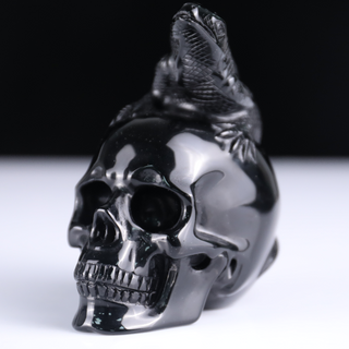 Crâne de lézard en obsidienne noire